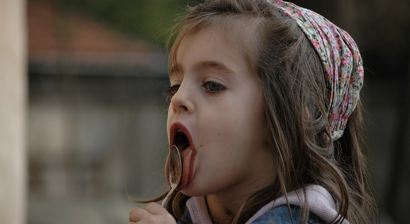 Girl eating Nutella